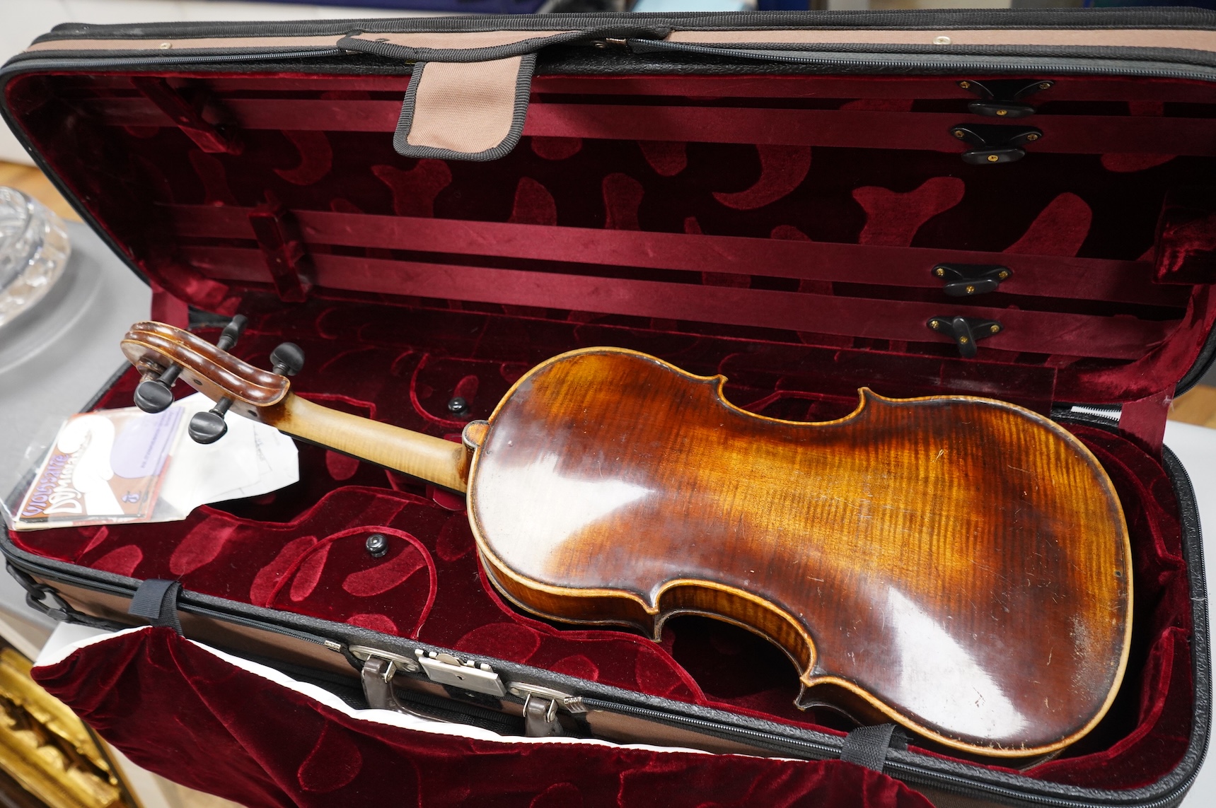 A cased late 19th century German viola, the body 15 3/4”, bearing a label reading Max Lutz 1939